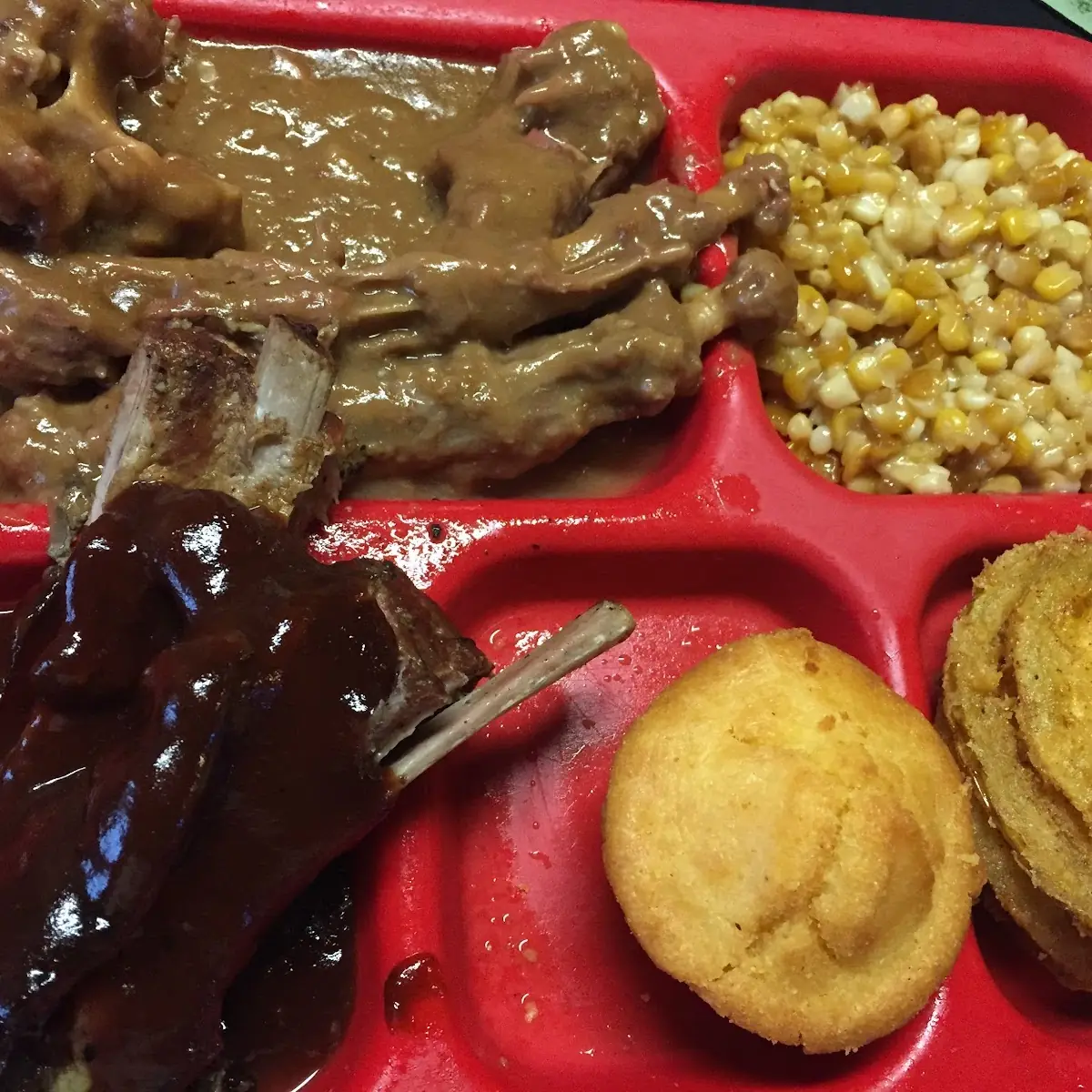 Oxtail in Gravy BBQ Ribs Corn Bread Fried Green Tomatoes and Sweet Corn