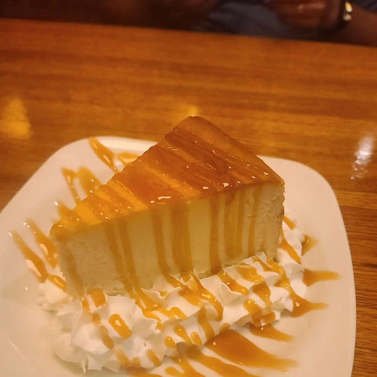 Cheese Cake with Caramel Sauce and Extra Whipped Topping