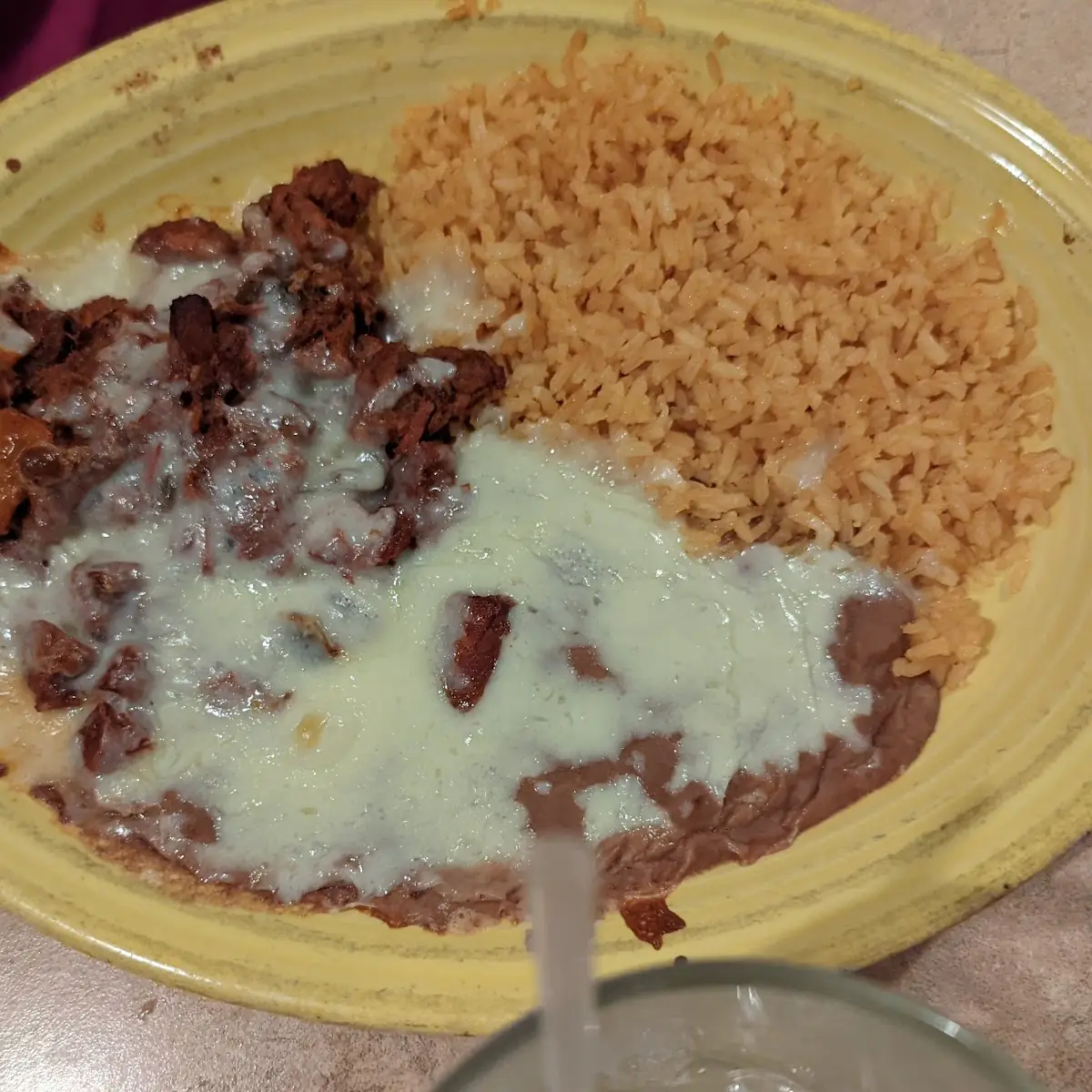 One Beef Taco Rice & Refried Beans