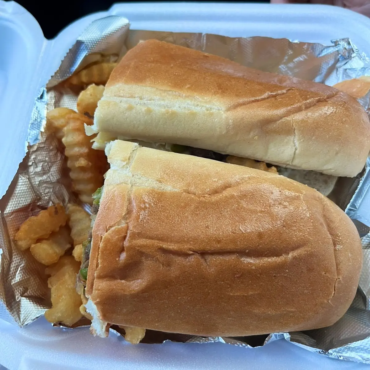 Cheesesteak Sandwich with Crinkle Fries