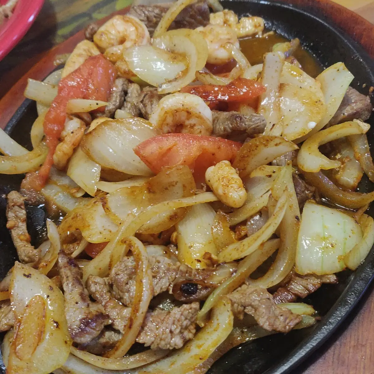 Beef Chicken & Shrimp Fajitas