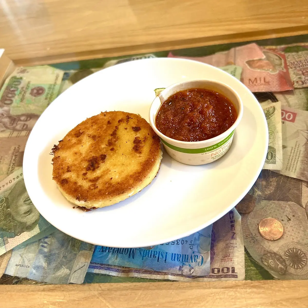 Arepa with Chiltomate Sauce