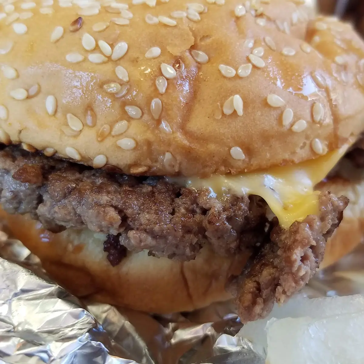 Single Cheeseburger with Grilled Onions