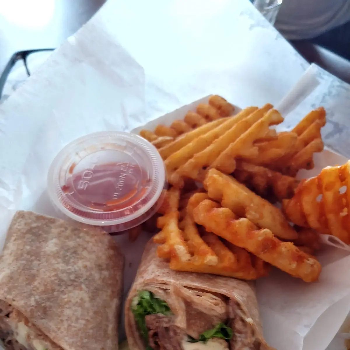 Steak and Cheese Wrap and Waffle Fries