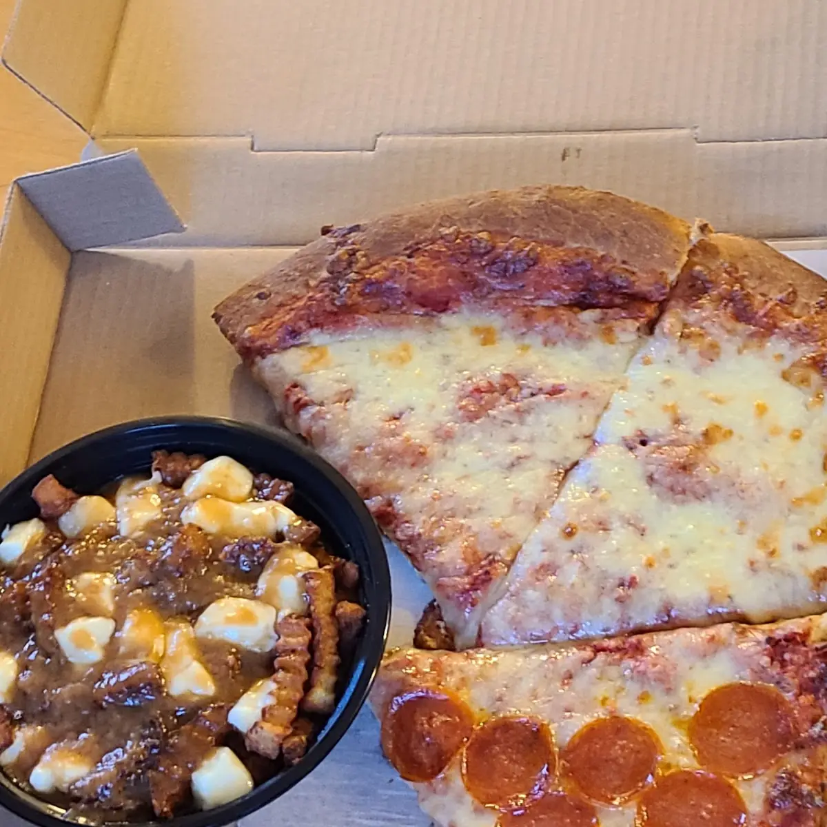 Poutine with Cheese and Pepperoni Pizza Slices