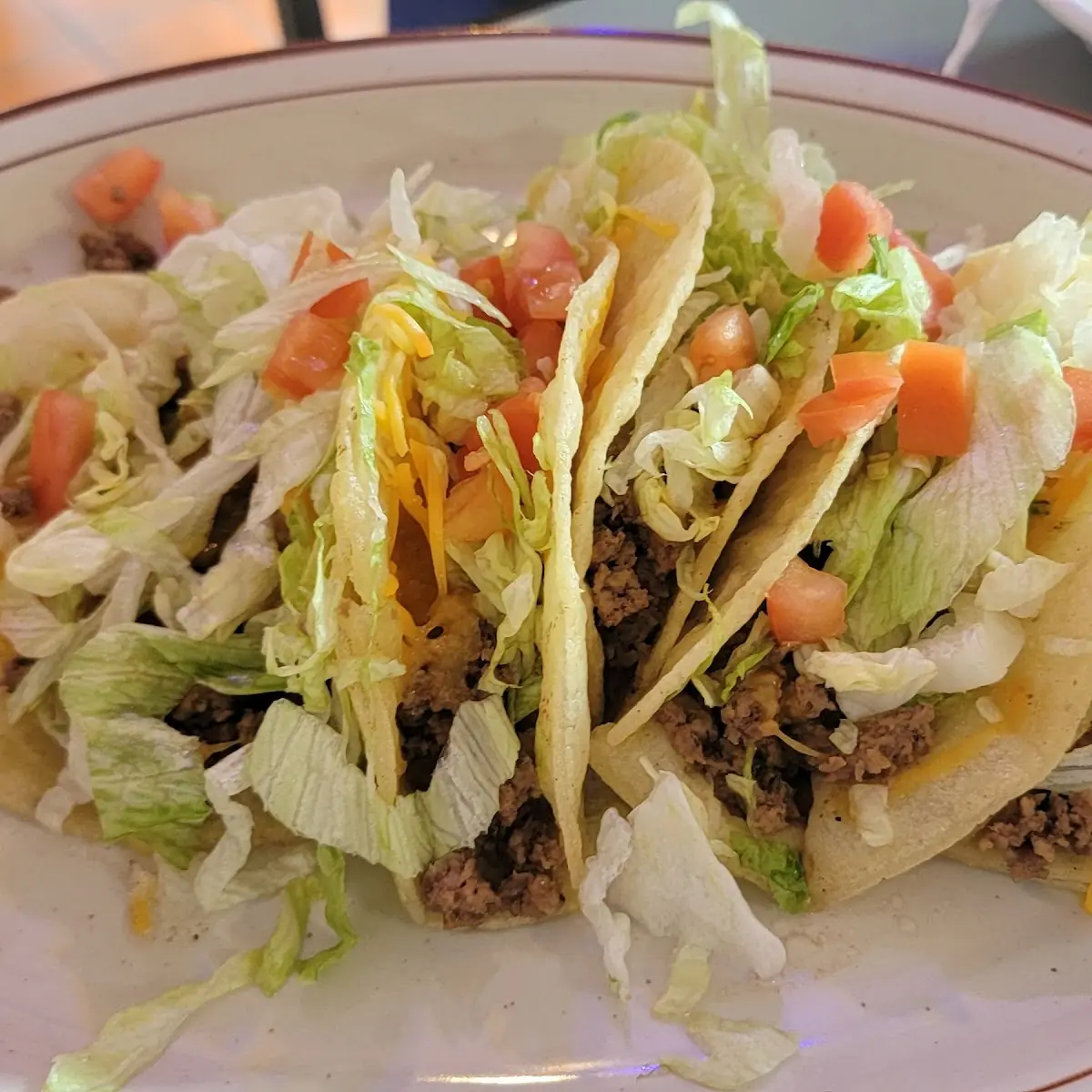 Medium Shell Taco with Cheese and Hot Sauce