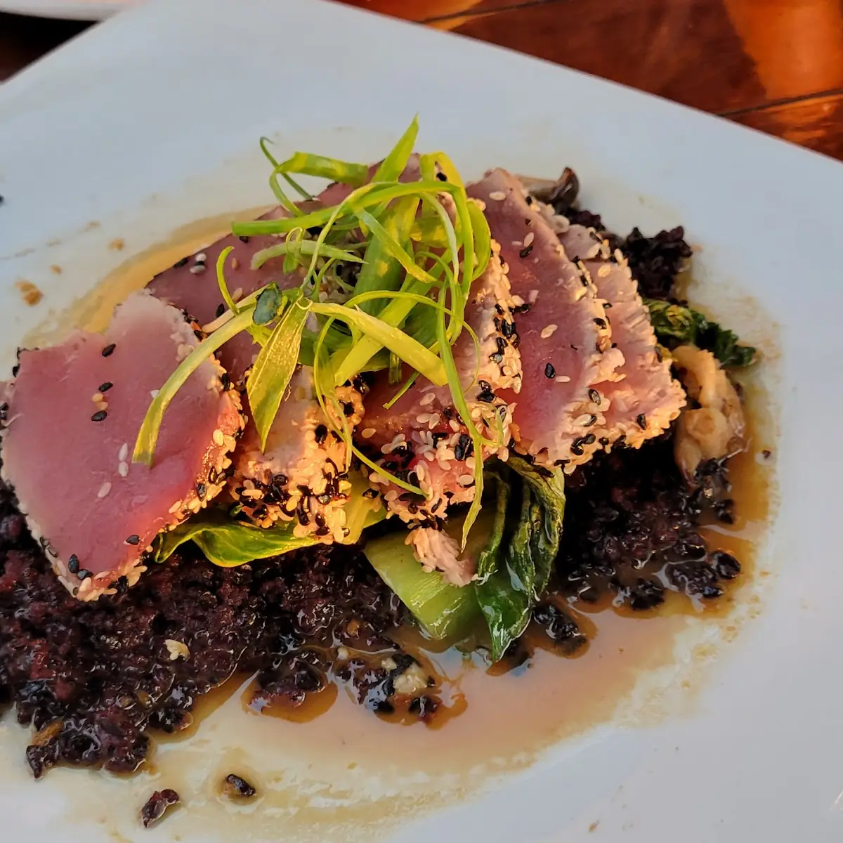 Sesame-Crusted Seared Ahi Coconut Forbidden Rice Beech Mushrooms & Ginger-Ponzu Sauce