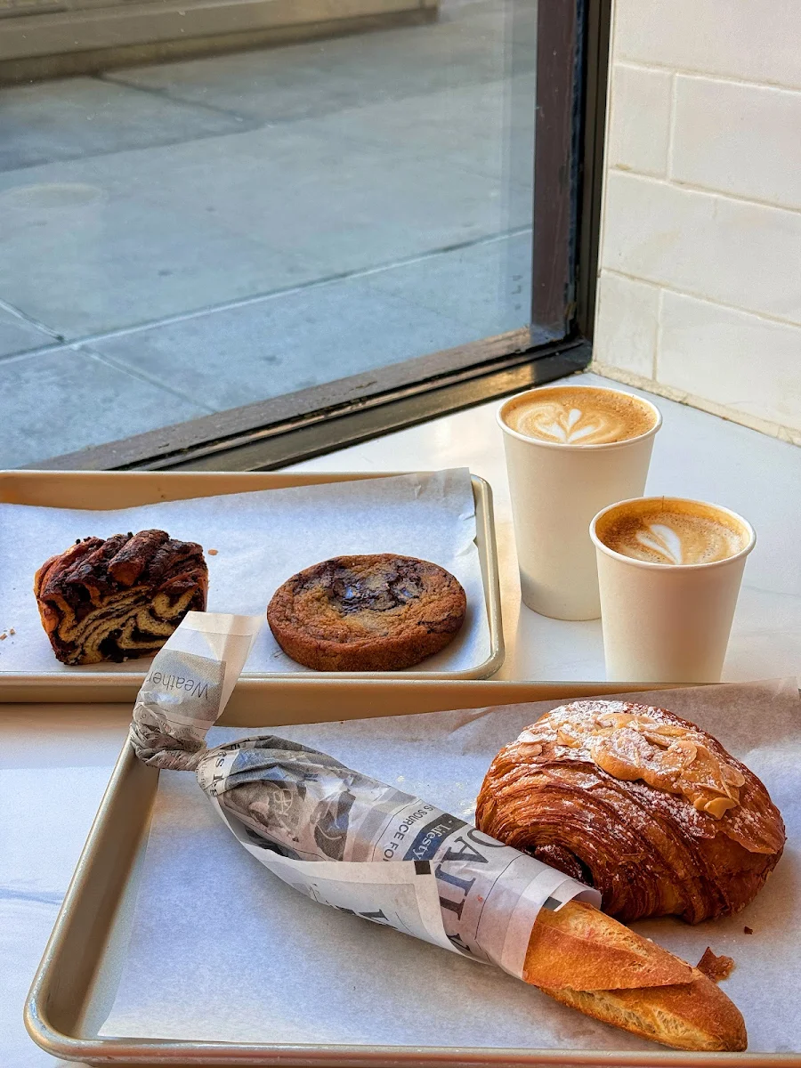 Assorted Fresh Pastries and Sandwiches