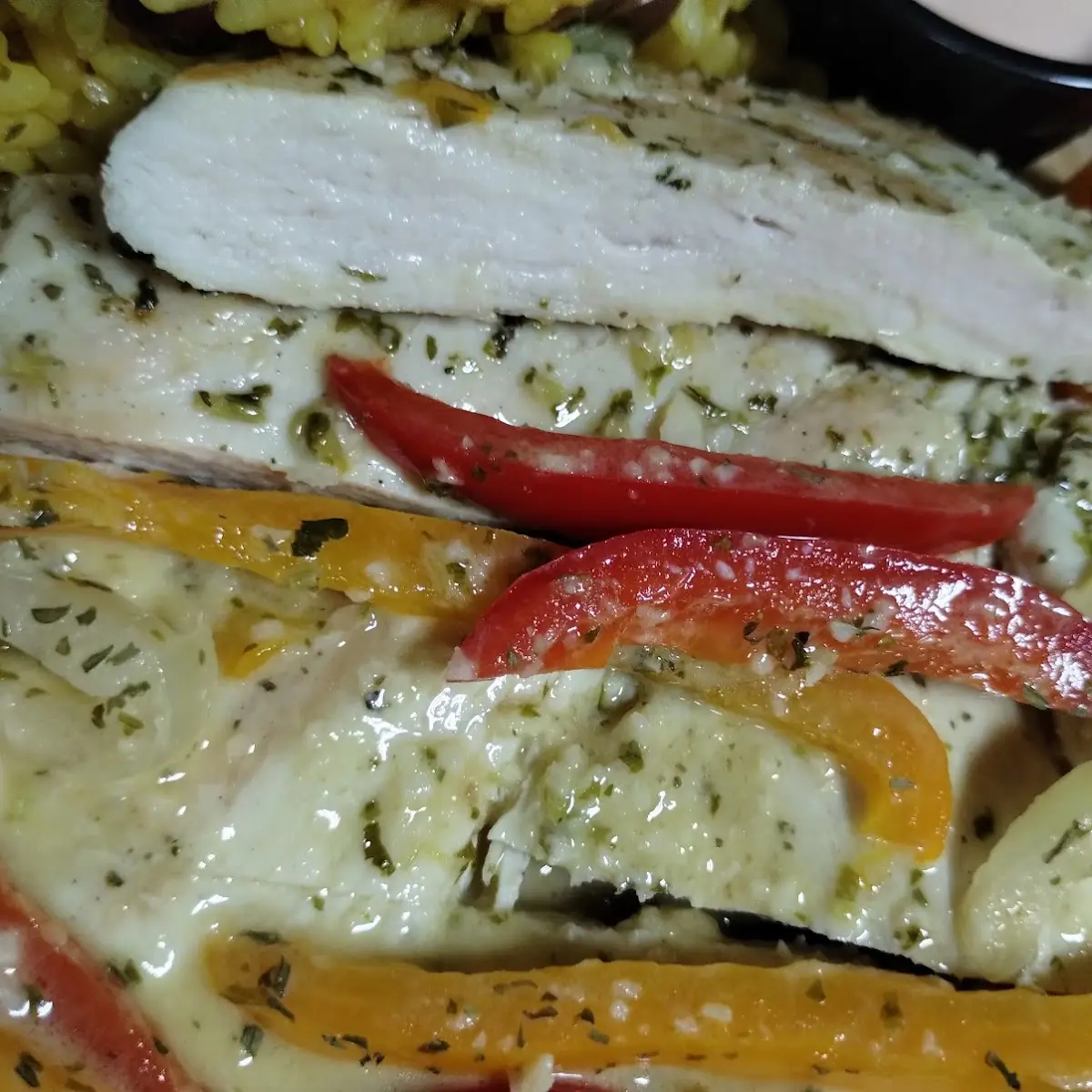 Grilled Chicken Made with Garlic Sauce Accompanied with Colorful Peppers Perfectly Cooked