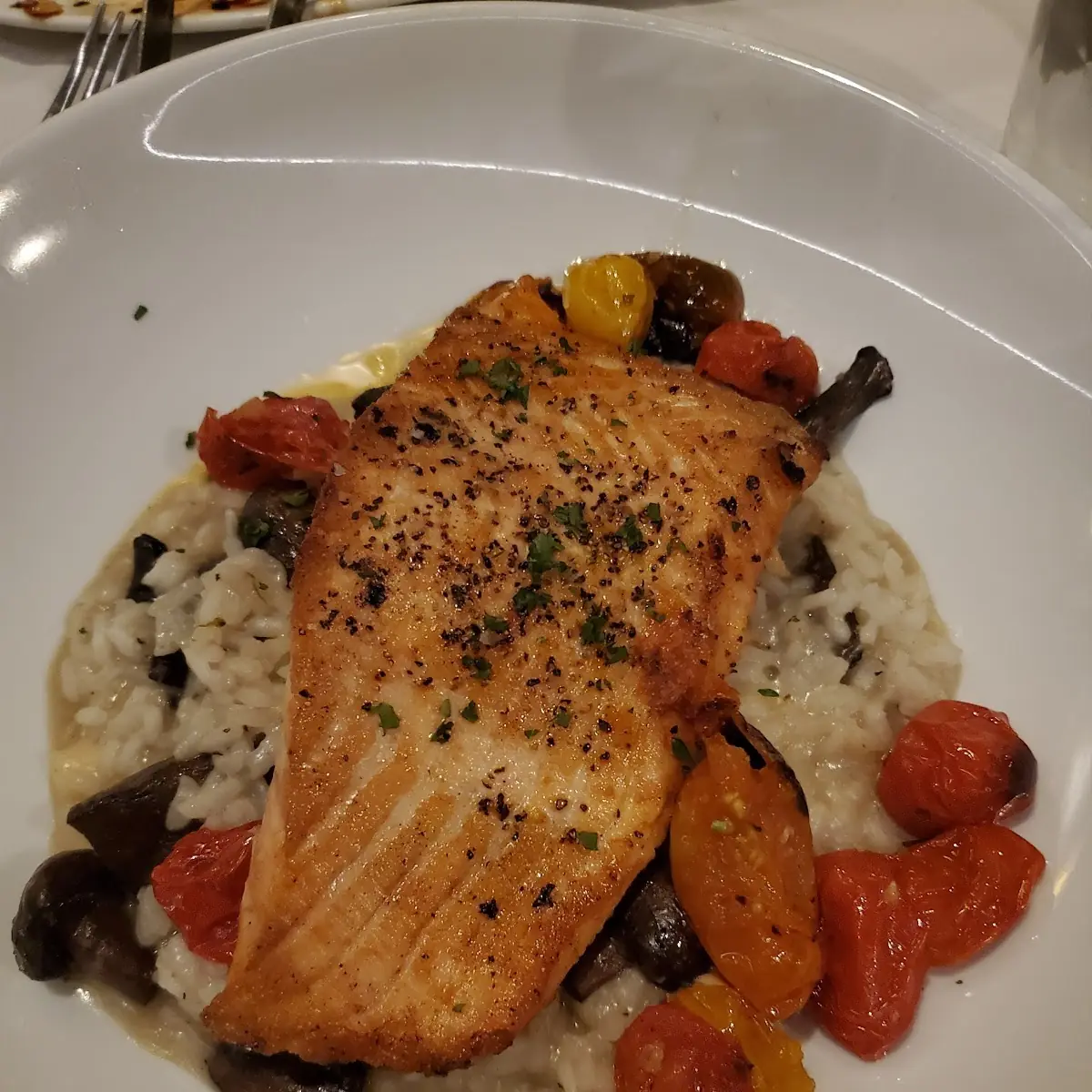 Salmon Filet with Mushroom Risotto and Blistered Tomato