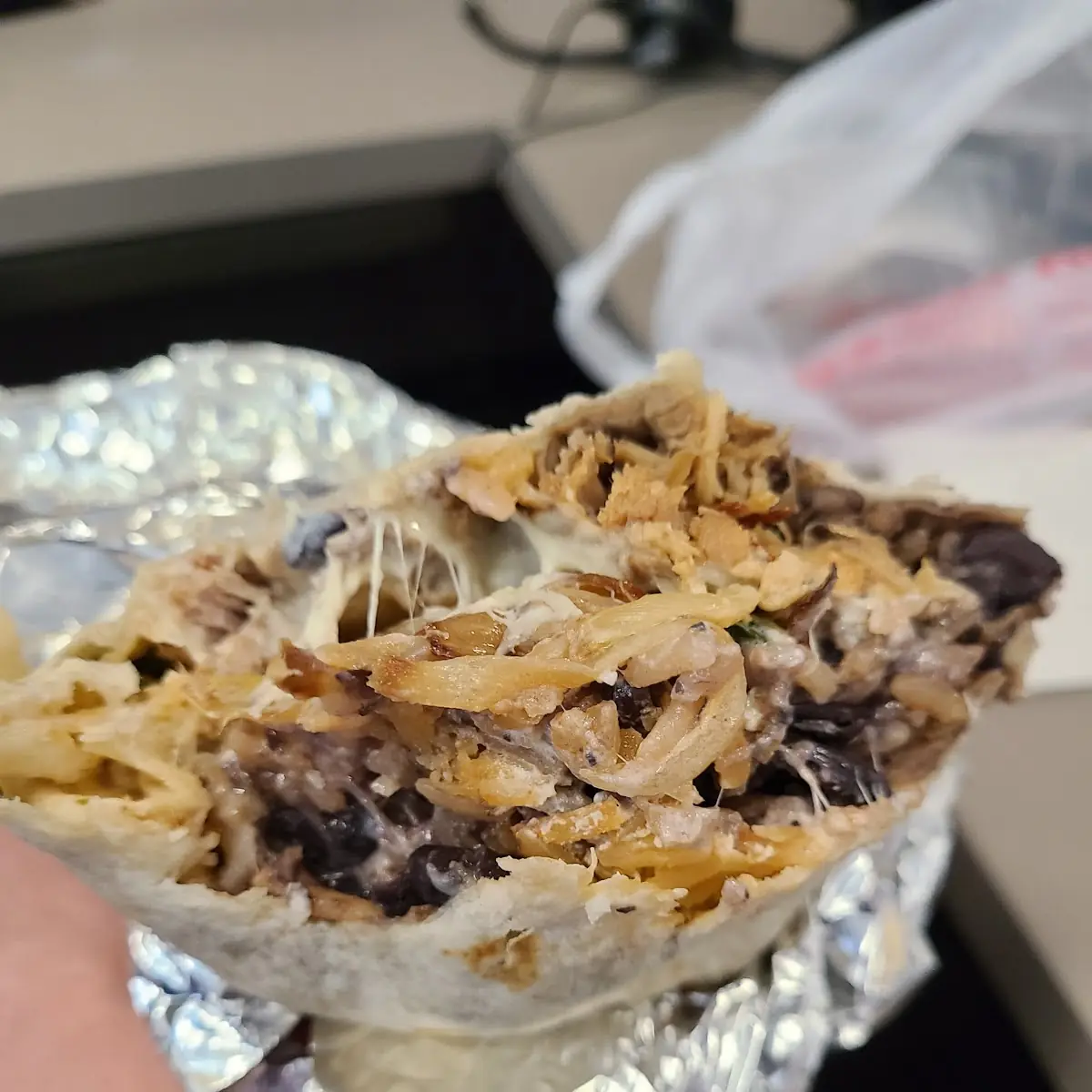 Snake Bite Carnitas Burrito 10 10