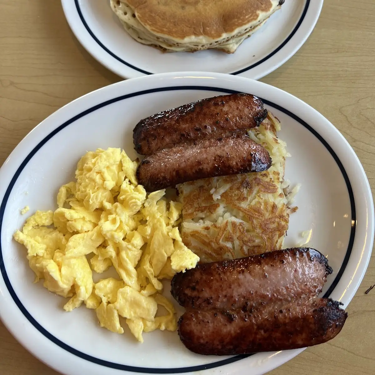 Pancake Combo with Scrambled Eggs Bacon and Hash Browns