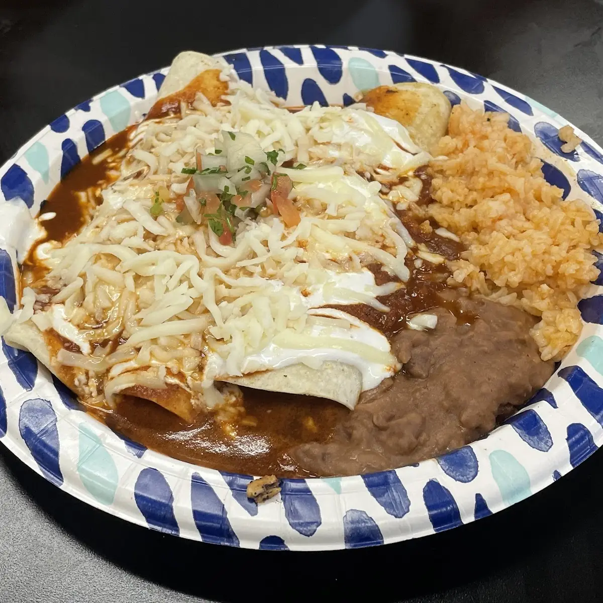 Enchilada Plate with Rice and Beans