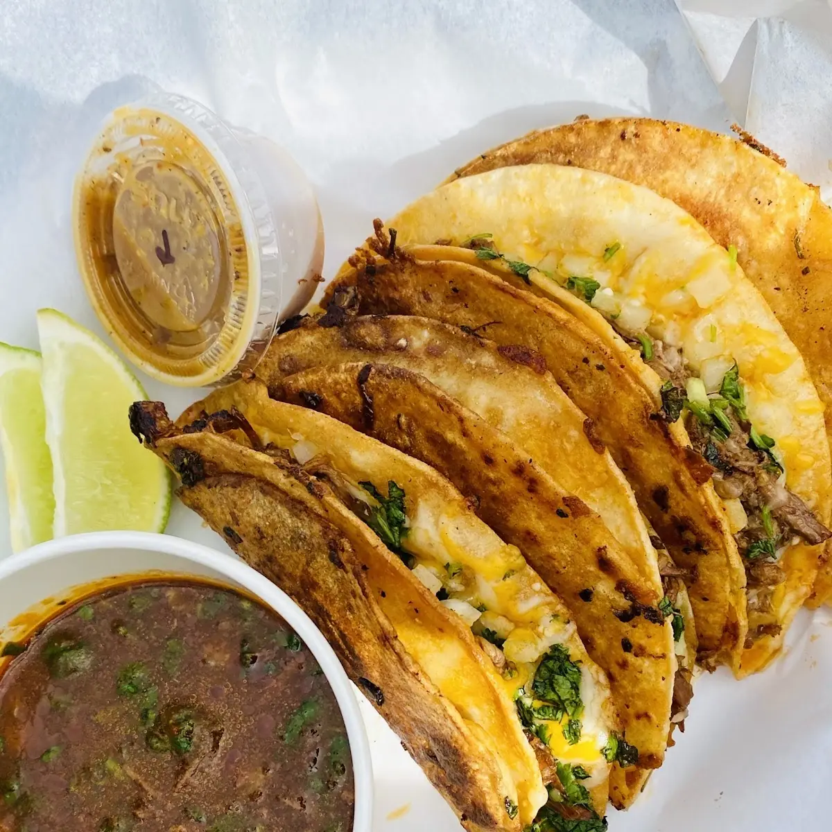 Birria Tacos with Consomé