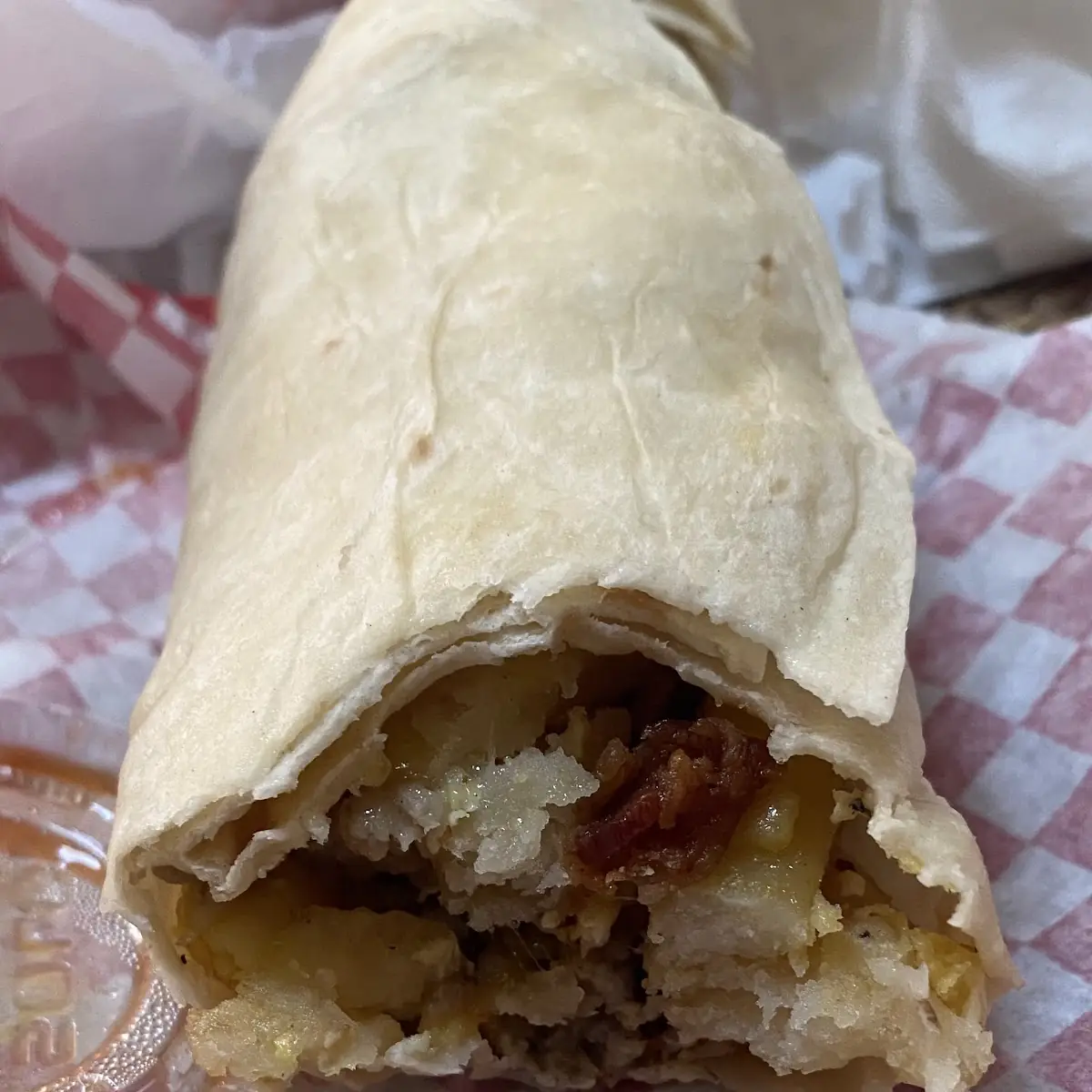 Sausage Bacon Eggs Potatoes and Eggs Burrito