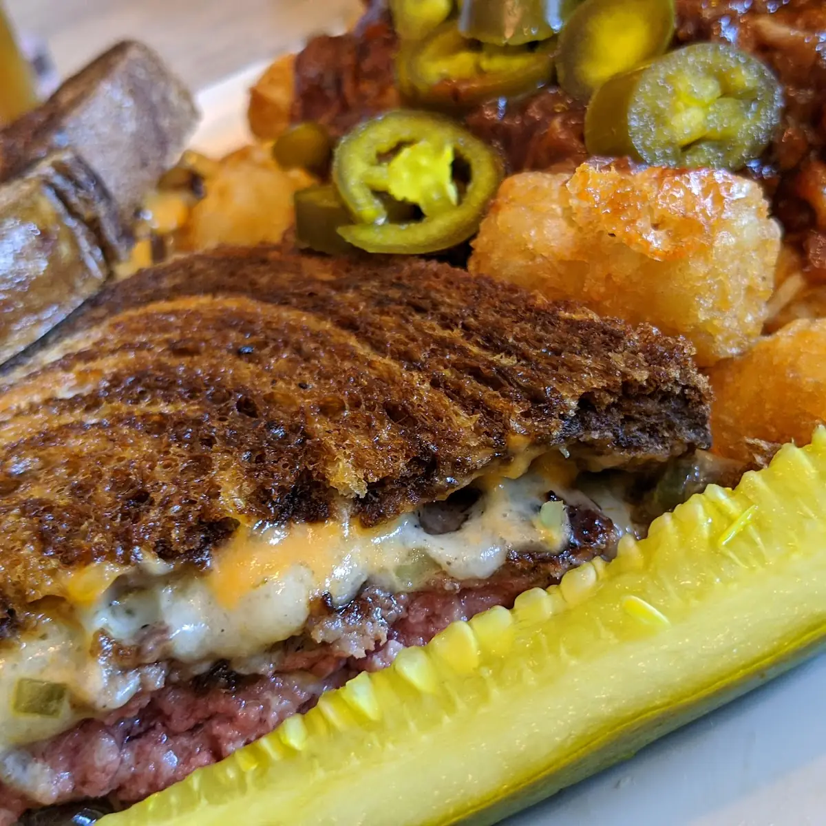 Patty Melt with Pulled Pork Tots