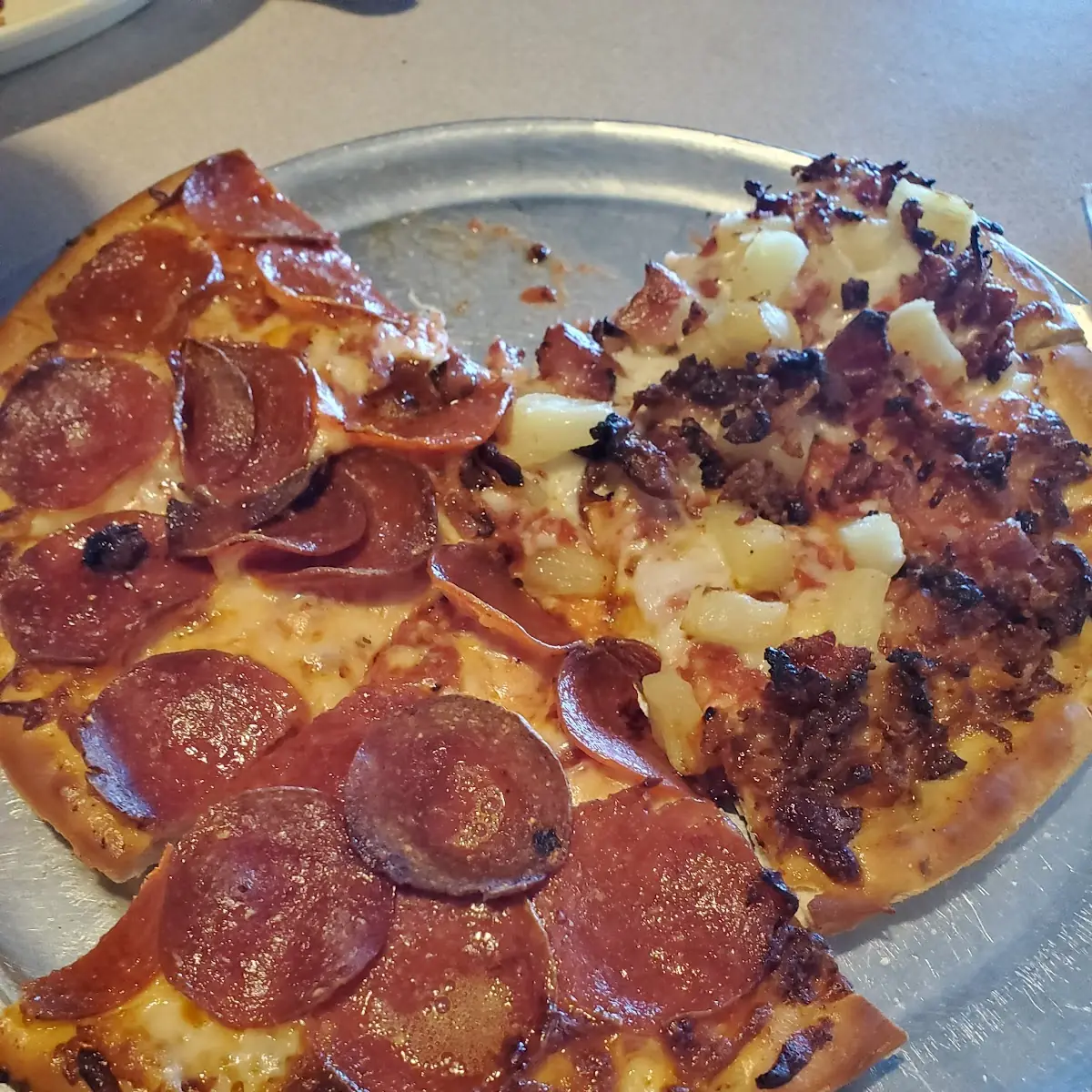 Half Pepperoni and Half Hawaiian Pizza