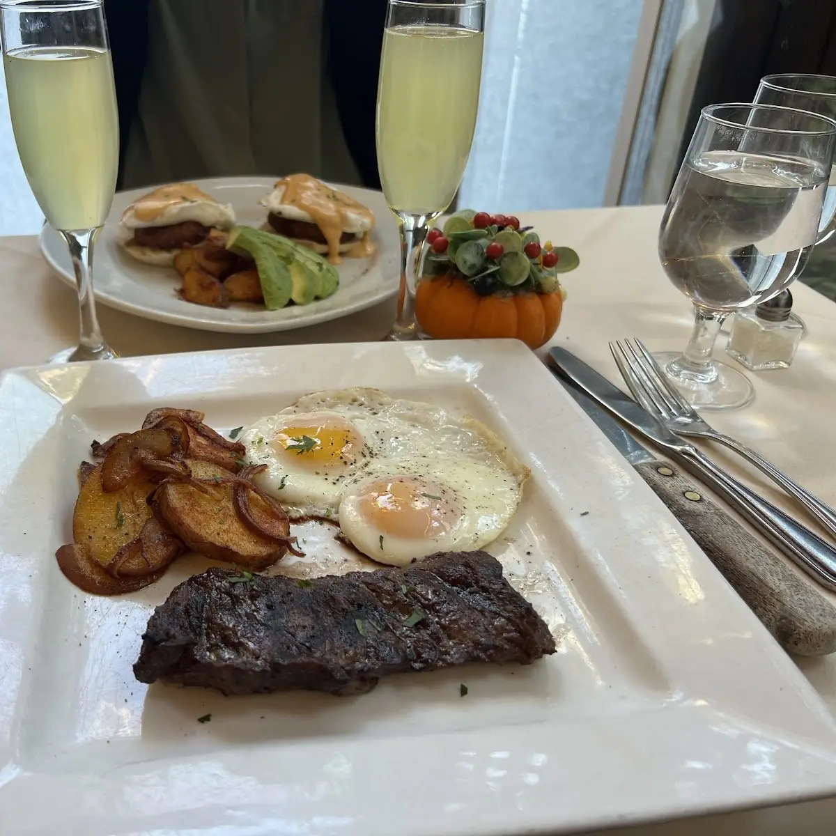 N Y Strip and Eggs Scalini Hash Brown