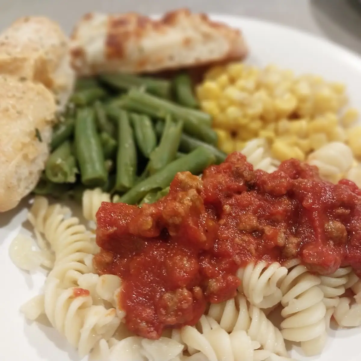 Selections from the Buffet Green Beans Corn Bread Stick Cheese Stick & Pasta with Sauce
