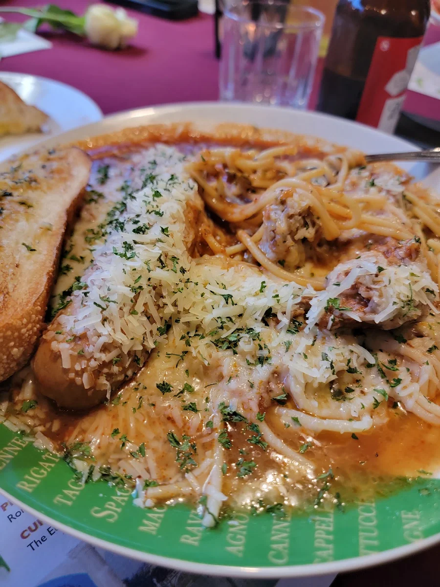 Pork Ribs with Sausage over Noodles