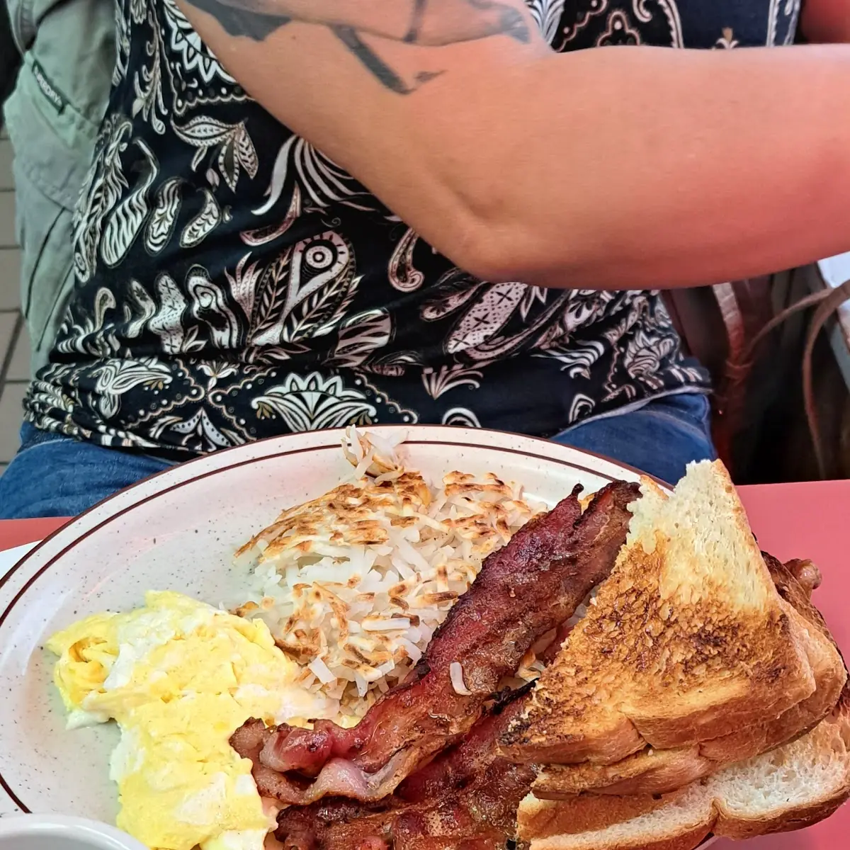 Scrambled Eggs with Bacon Hashbrowns and Sourdough Toast