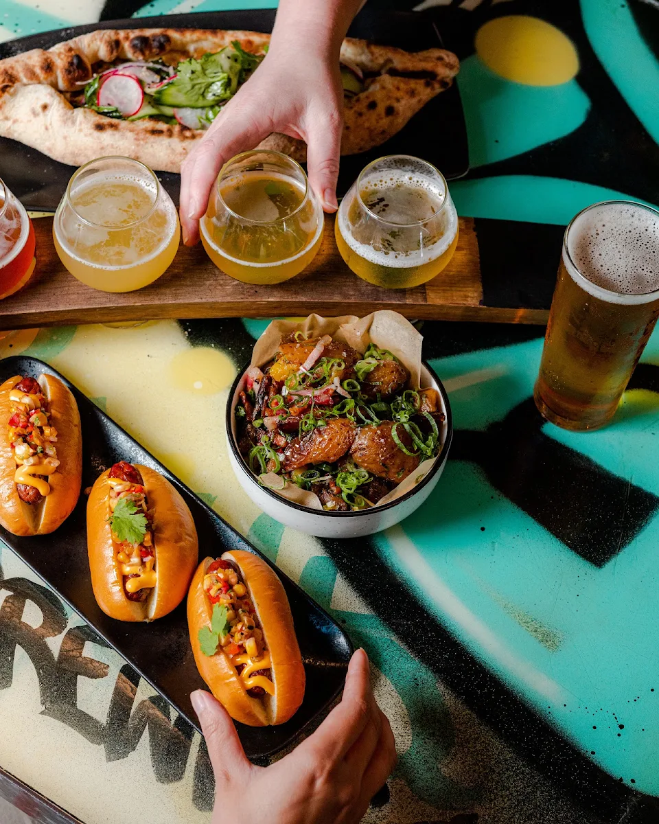 Chorizo Hot Dog Sliders Nacho Cheese Charred Corn & Aji Amarillo Salsa