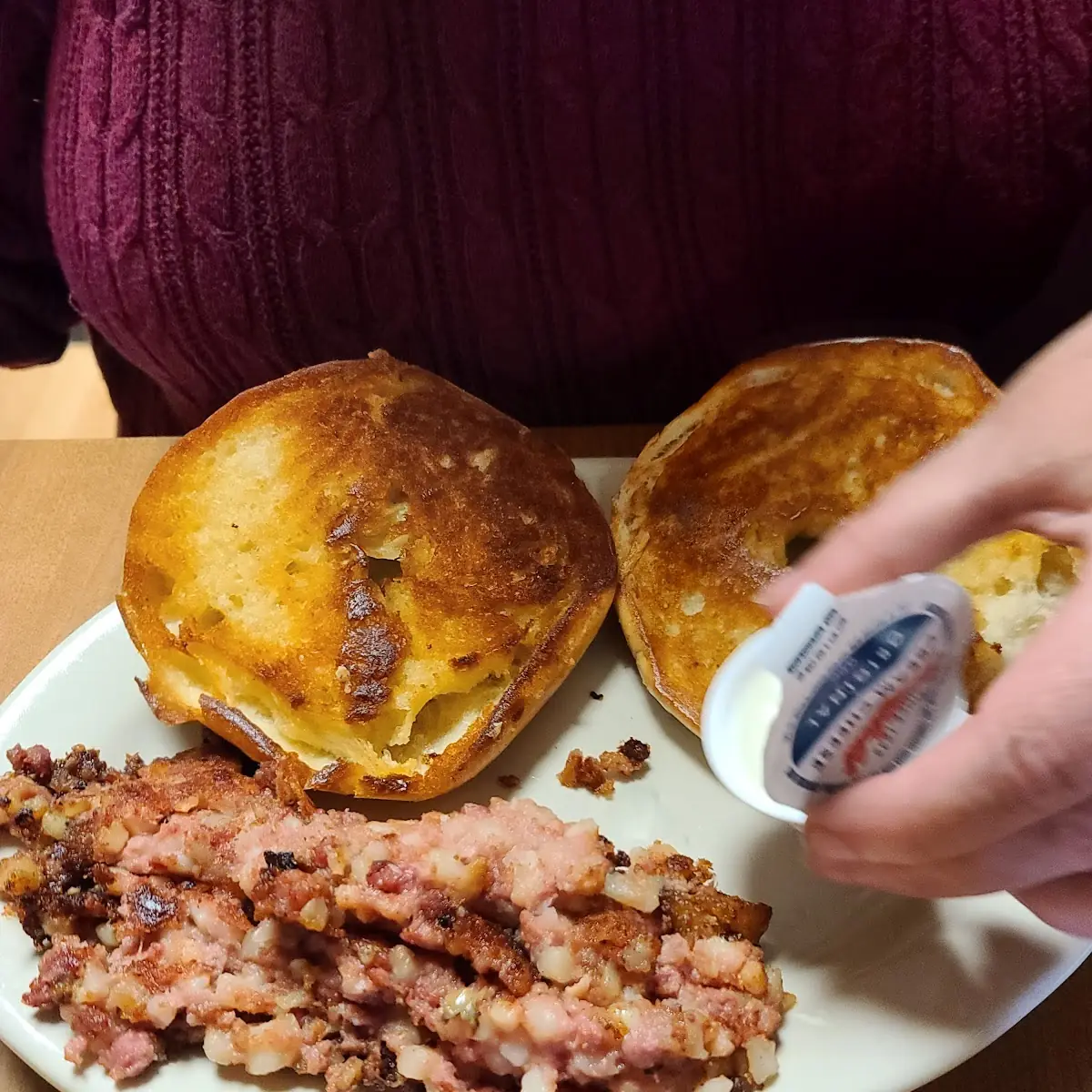 Bagel with Cream Cheese and Corned Beef Hash