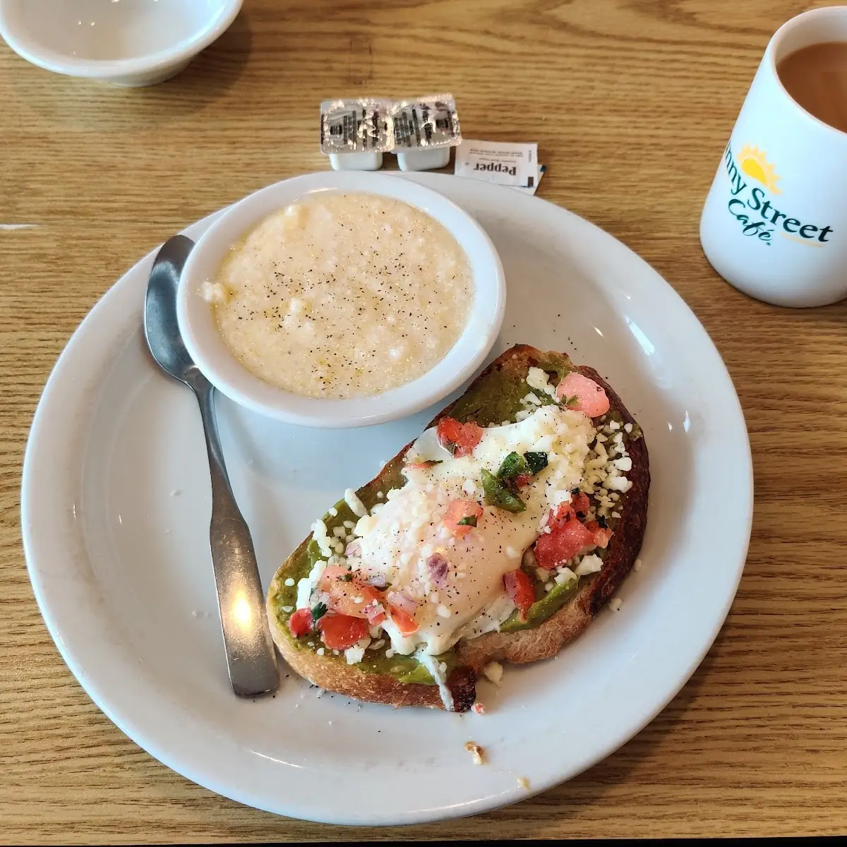 Smashed Avocado with Poached Egg and Grits