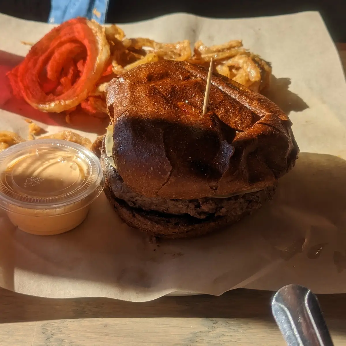 Moxie Burger on Wheat Bun and Onion Staws