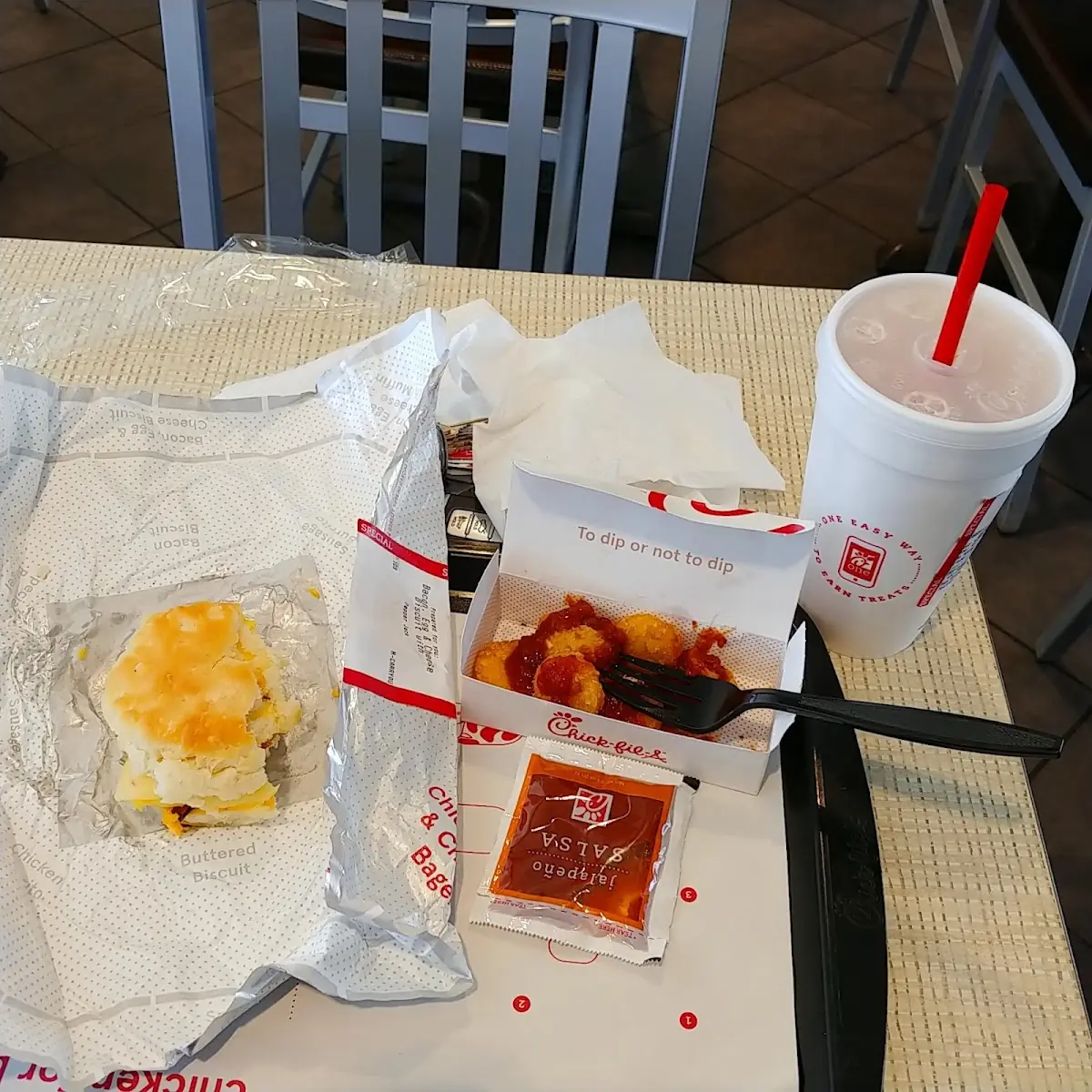 Bacon Egg and Cheese Biscuit Hash Brown and a Drink