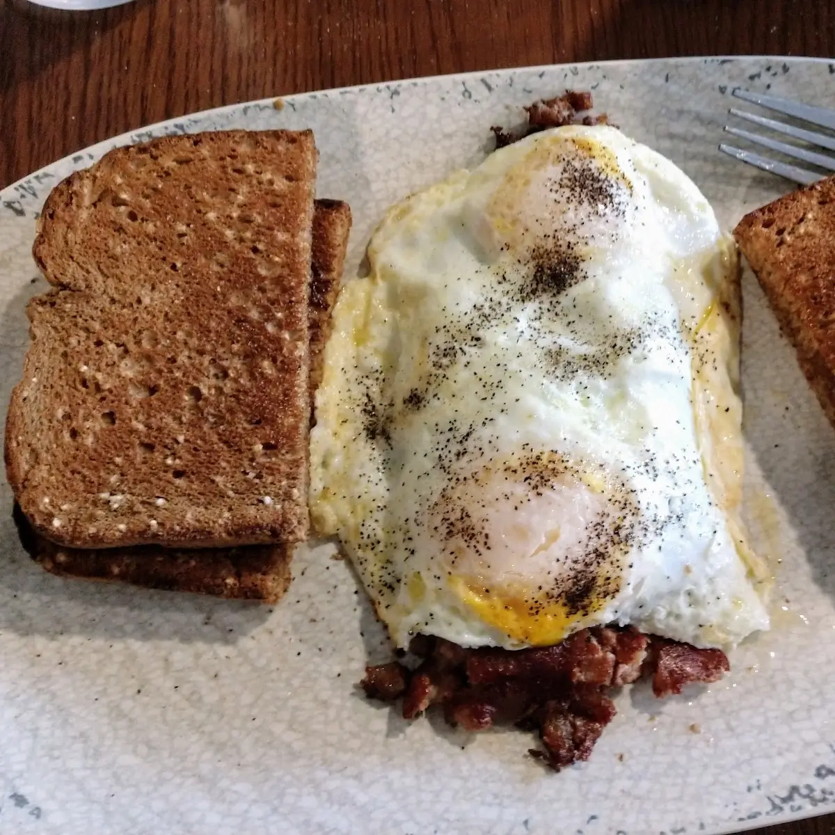 Corned Beef Hash with Fried Eggs and Toast