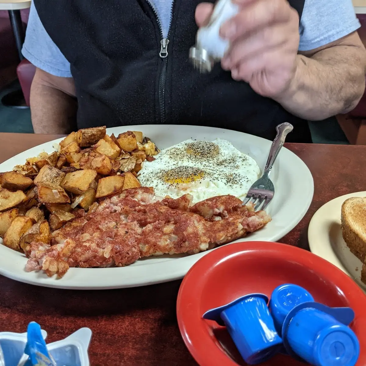 Corned Beef Hash Garlic Potatoes and Eggs Sunny Side Up with Jimmy's Potatoes