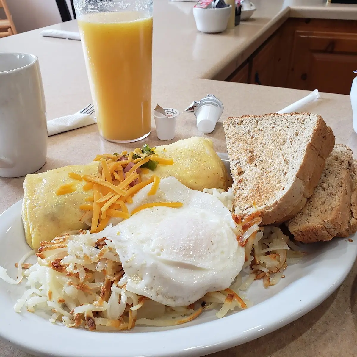 Denver Omelet with Hashbrowns & Egg on Top