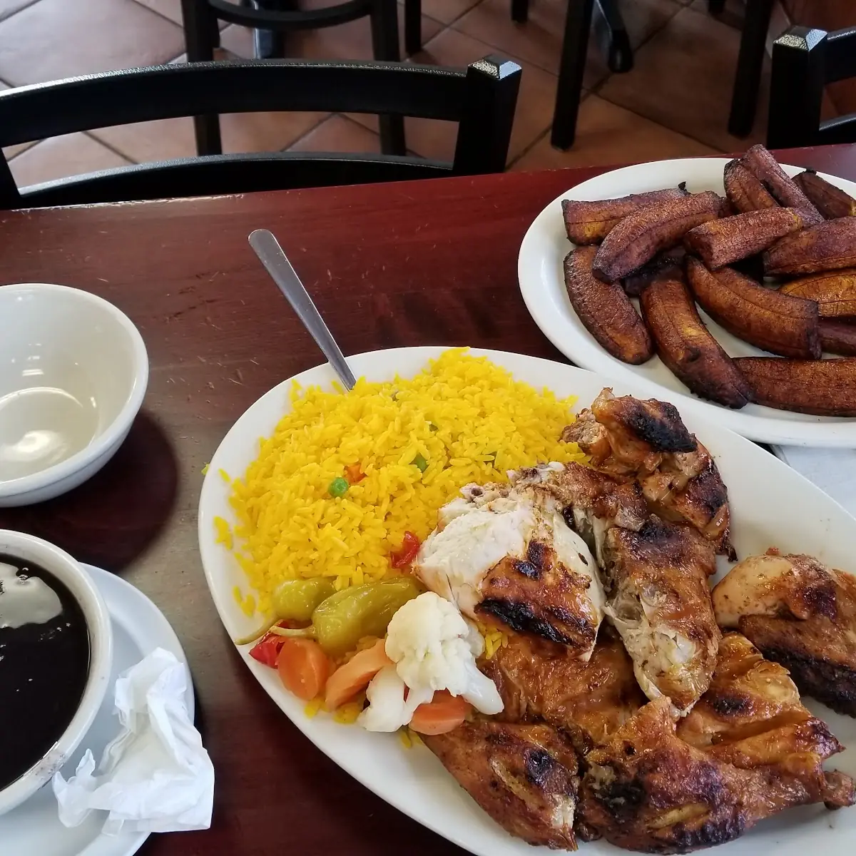 Grilled BBQ Chicken with Rice Pickled Vegetables Black Beans and Sweet Plantain