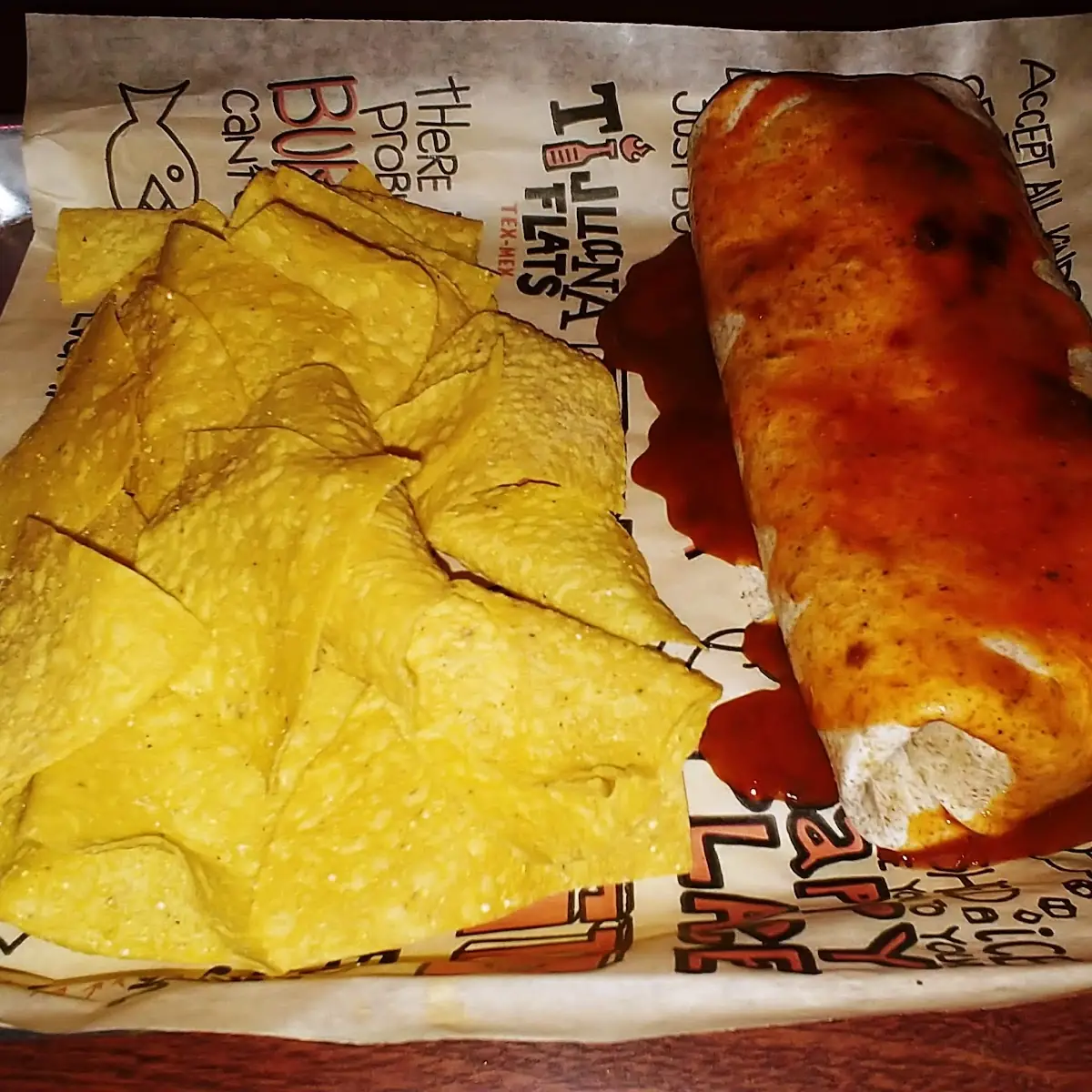 Beef Burrito with Chips and Hot Sauce
