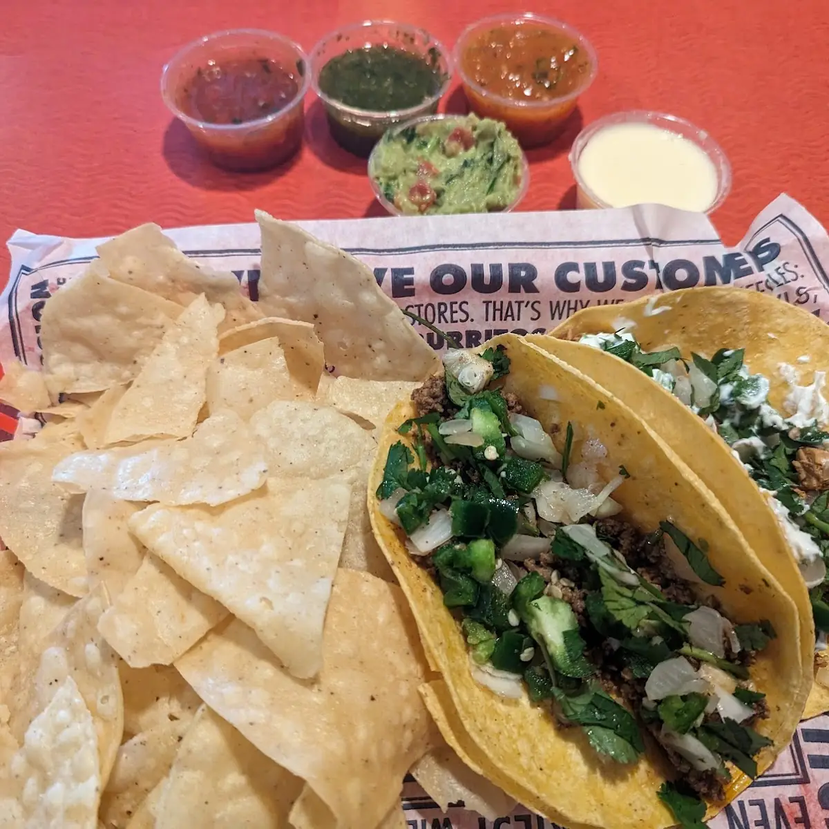 One Ground Beef Taco and One Spicy Chicken Taco