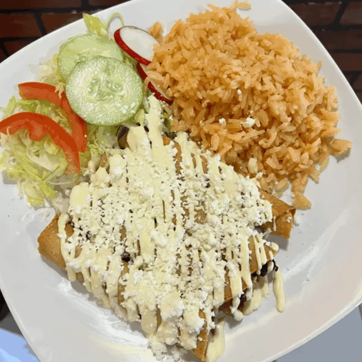 Shredded Chicken Enchiladas with Rice