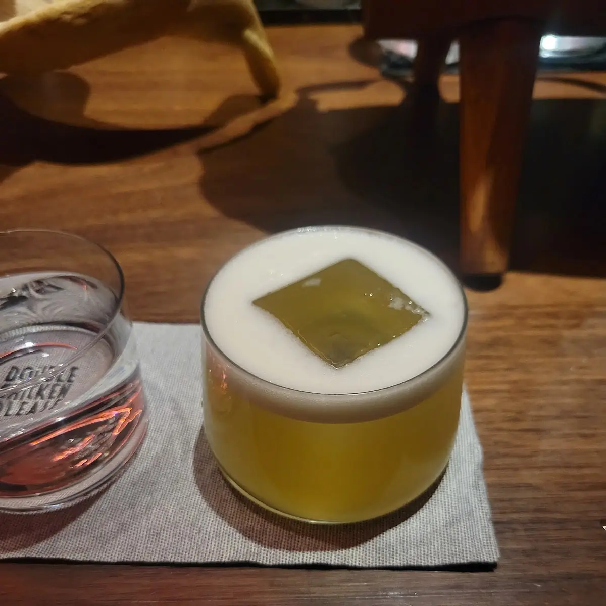 Two Craft Cocktails with Garnishes