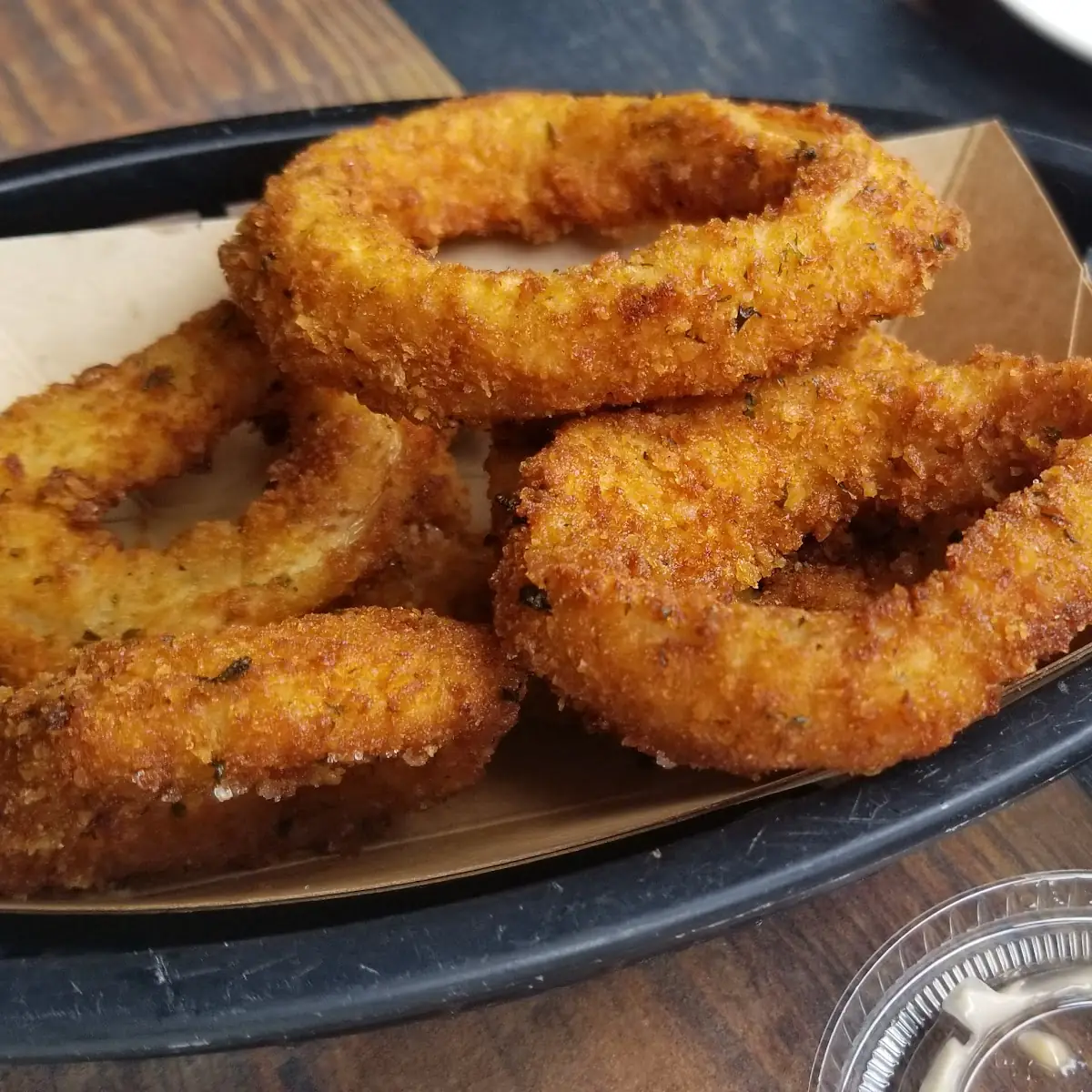 Hand Breaded Onion Rings with Chili Garlic Aioli