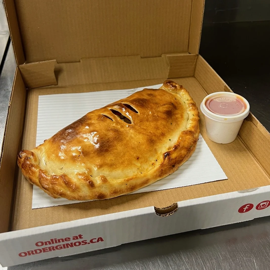 Calzone, Gino's Pizza and Spaghetti/Pisano's Old School Amherstview
