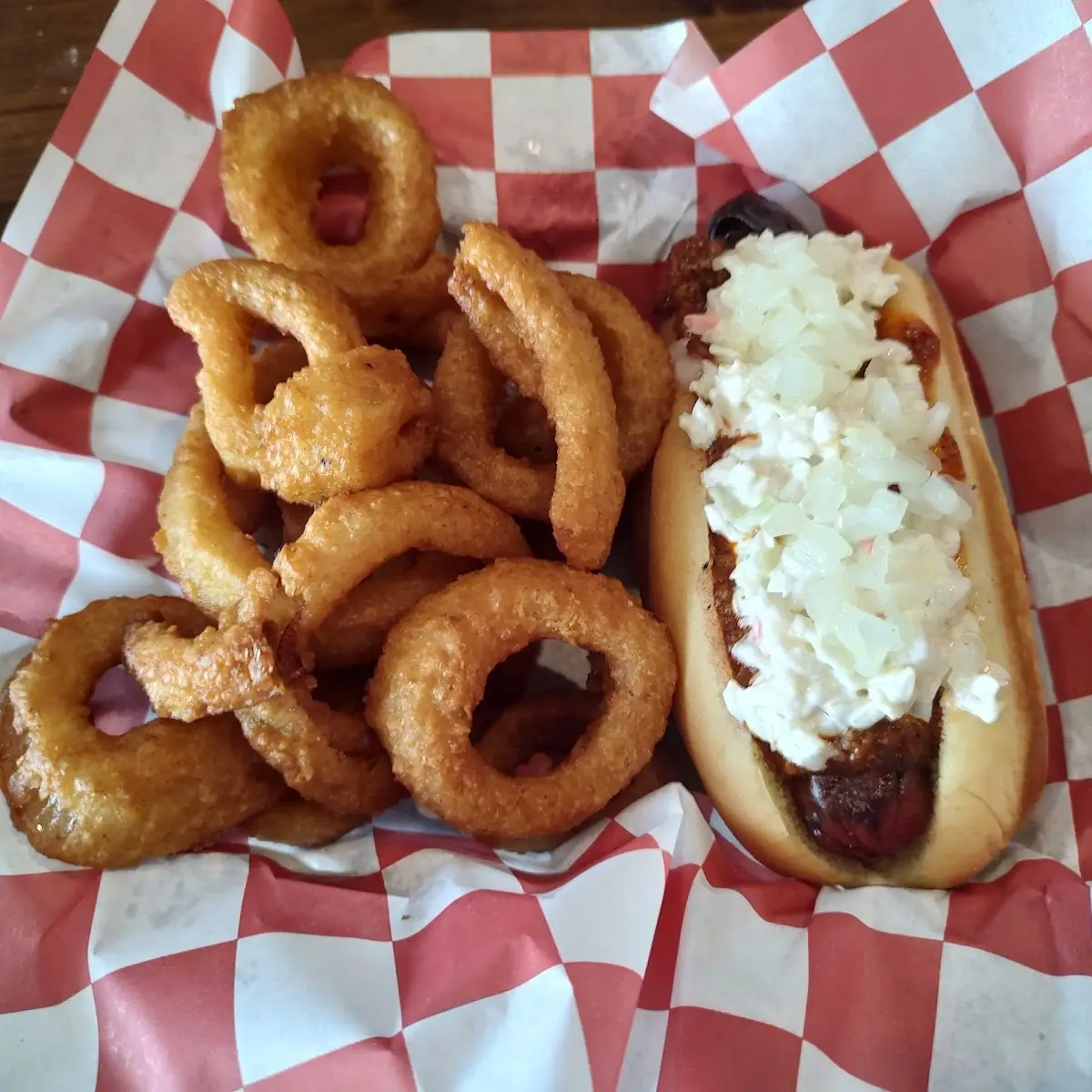 The Slaw-Ter Dawg with Onion Rings