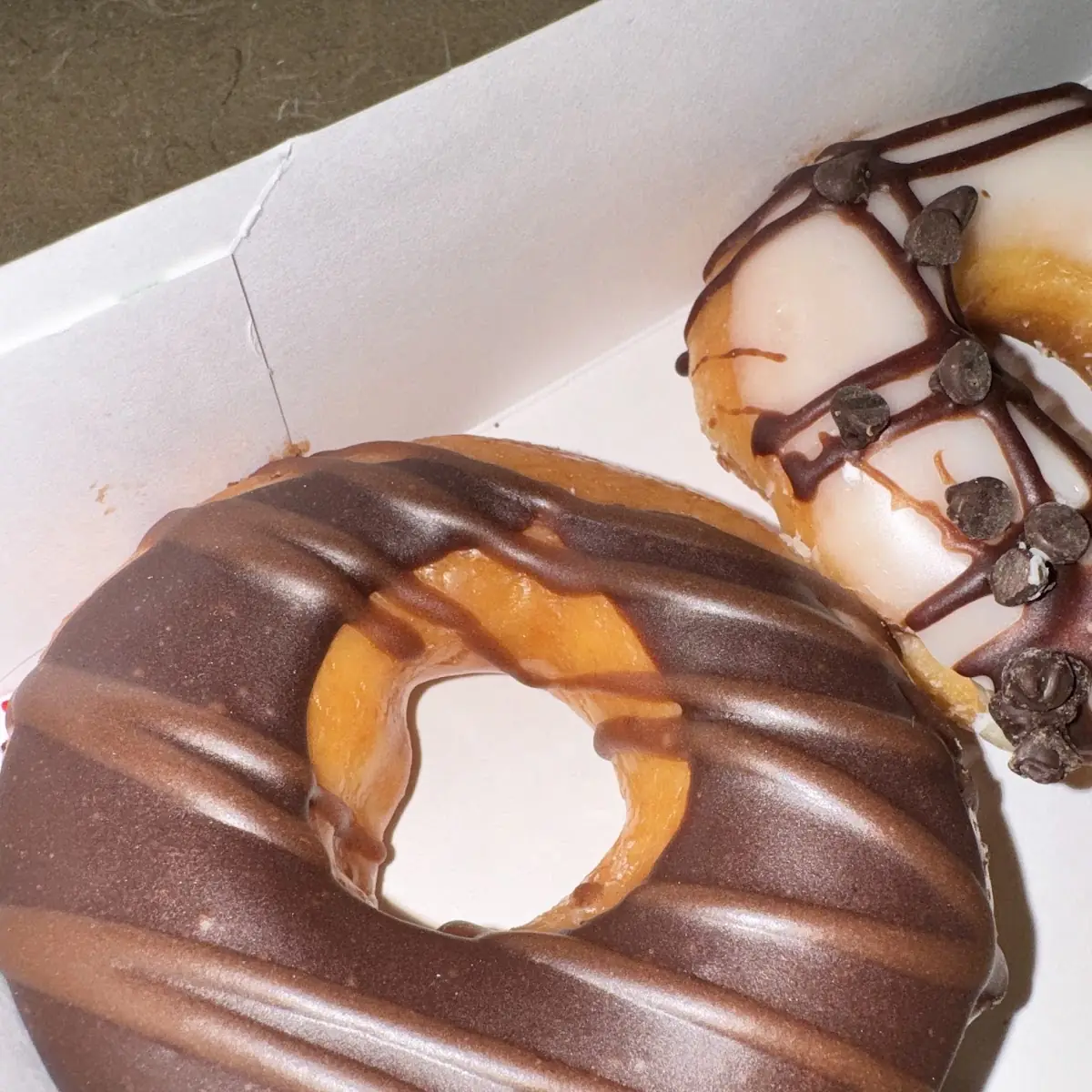 Chocolate Lover's Dozen Featuring New Reese's Peanut Butter Doughnuts