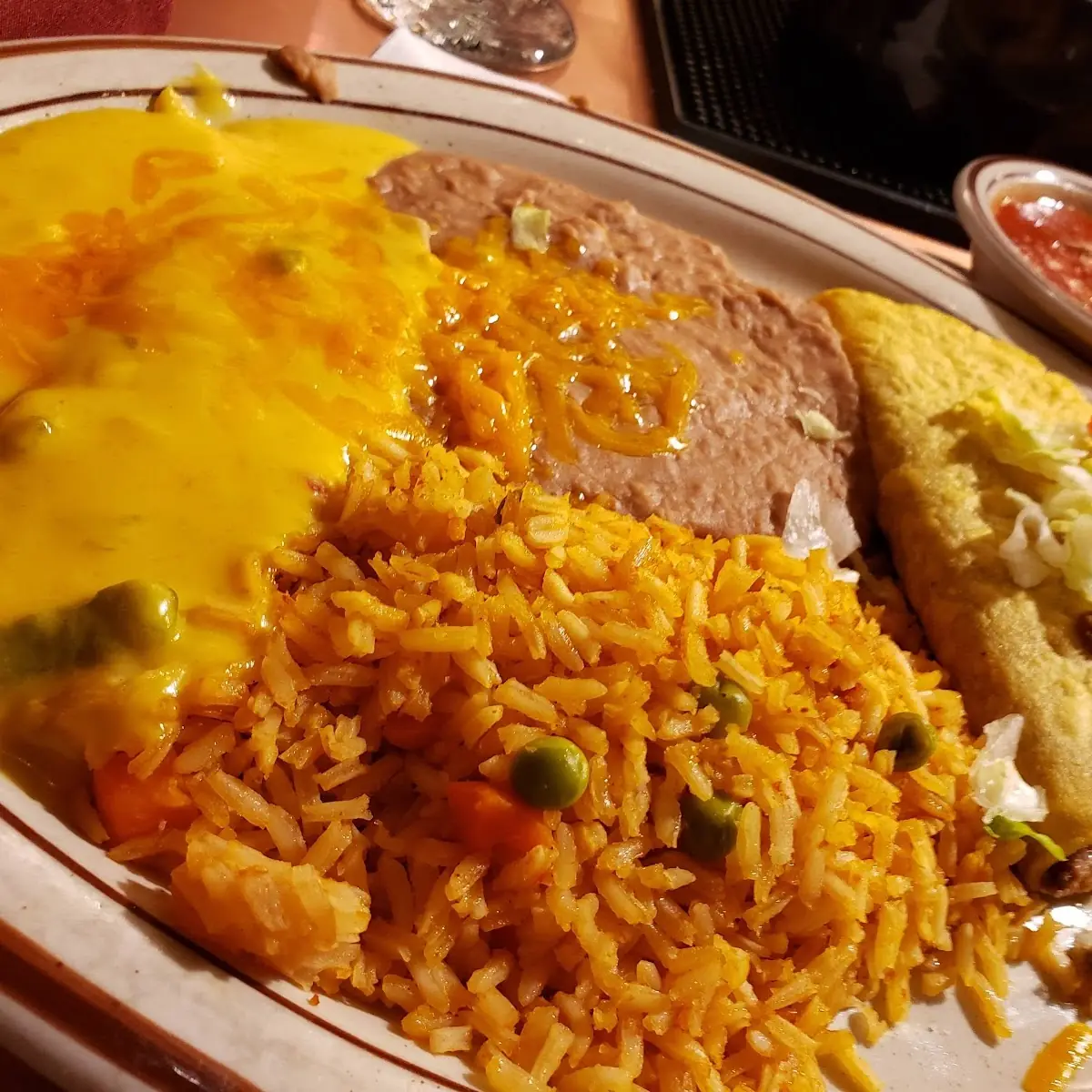Cheese Enchilada w Beef Taco-Rice & Beans