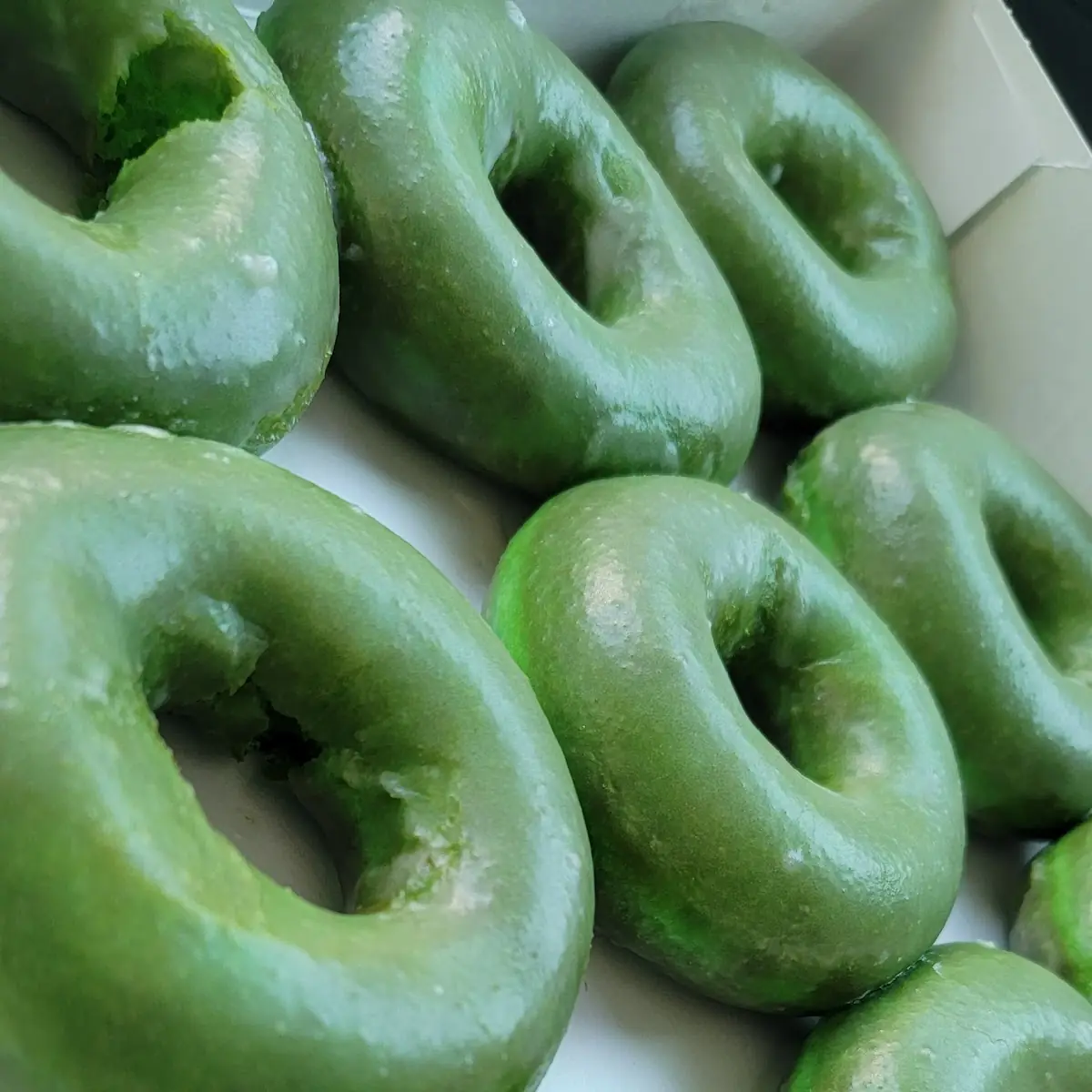 Green Colored Hot Glazed Doughnuts