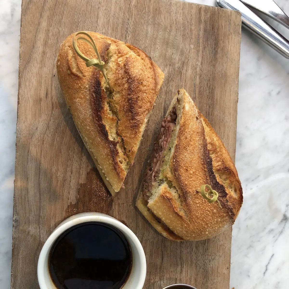 Shaved Ribeye on Charred Garlic Bread