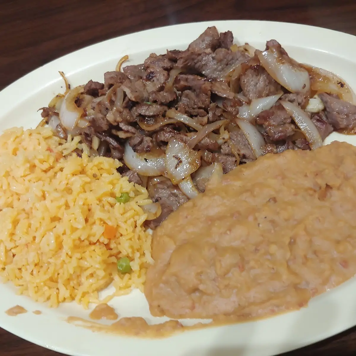 Carne Guisada Cheese Enchilada Rice and Beans