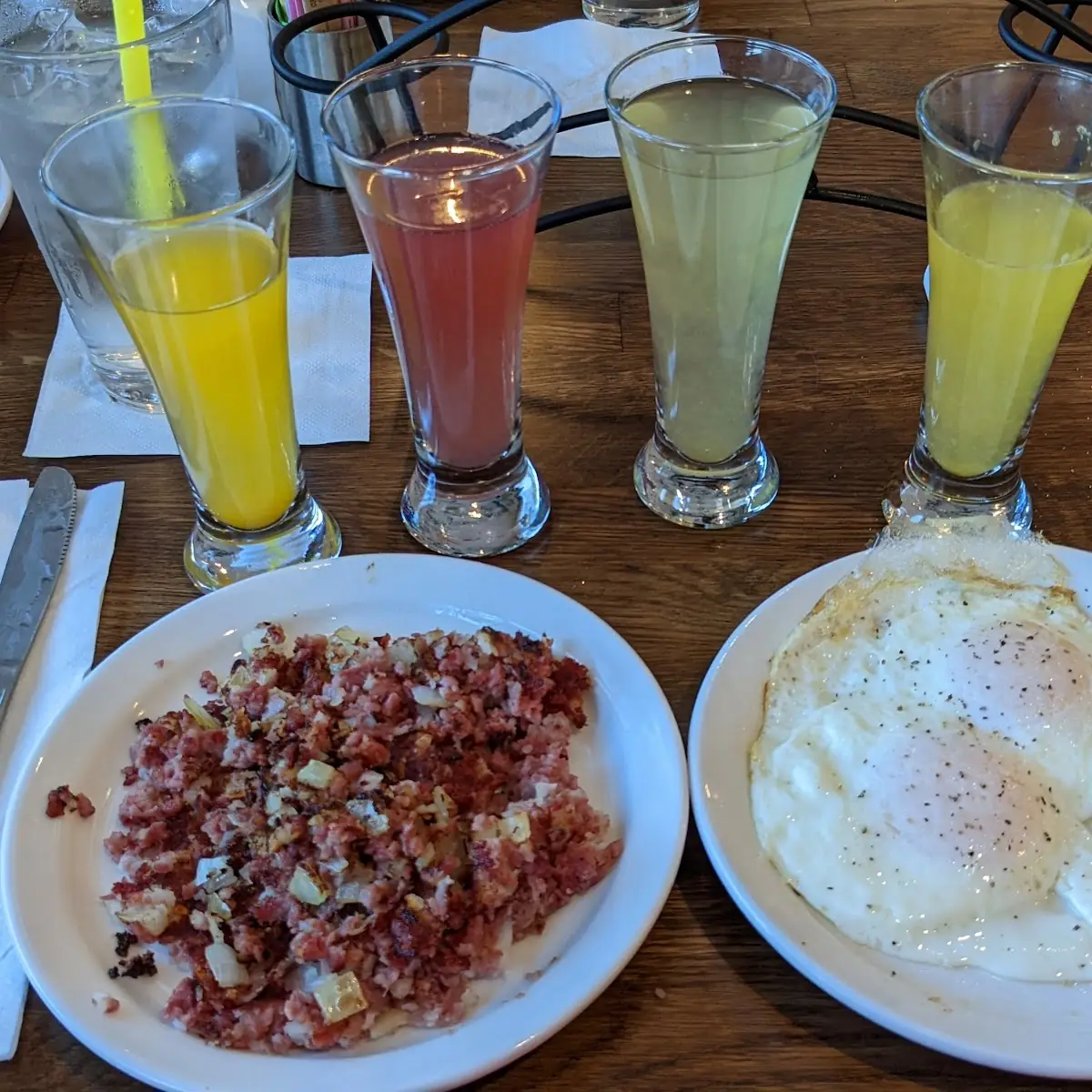 Corned Beef Hash Eggs over Medium with a Mimosa Flight