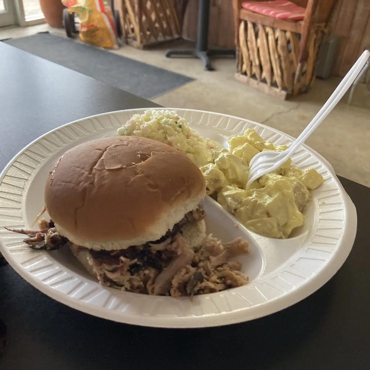 Pulled Pork Sandwich with Potato Salad and Coleslaw