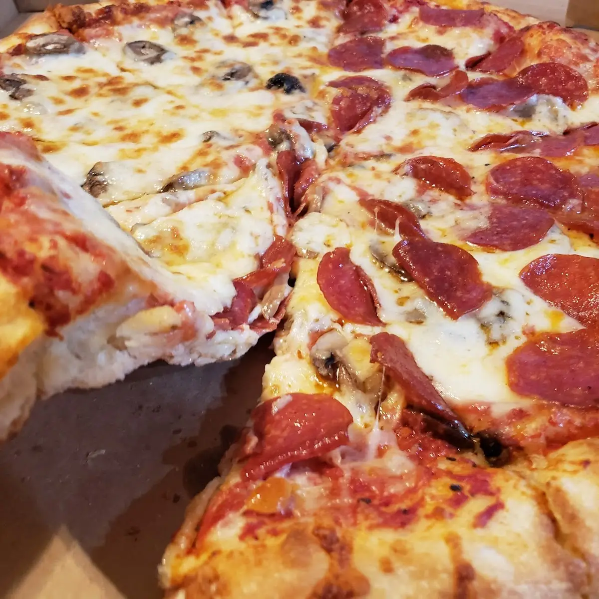 Large Pepperoni Mushroom and Cheese Pizza