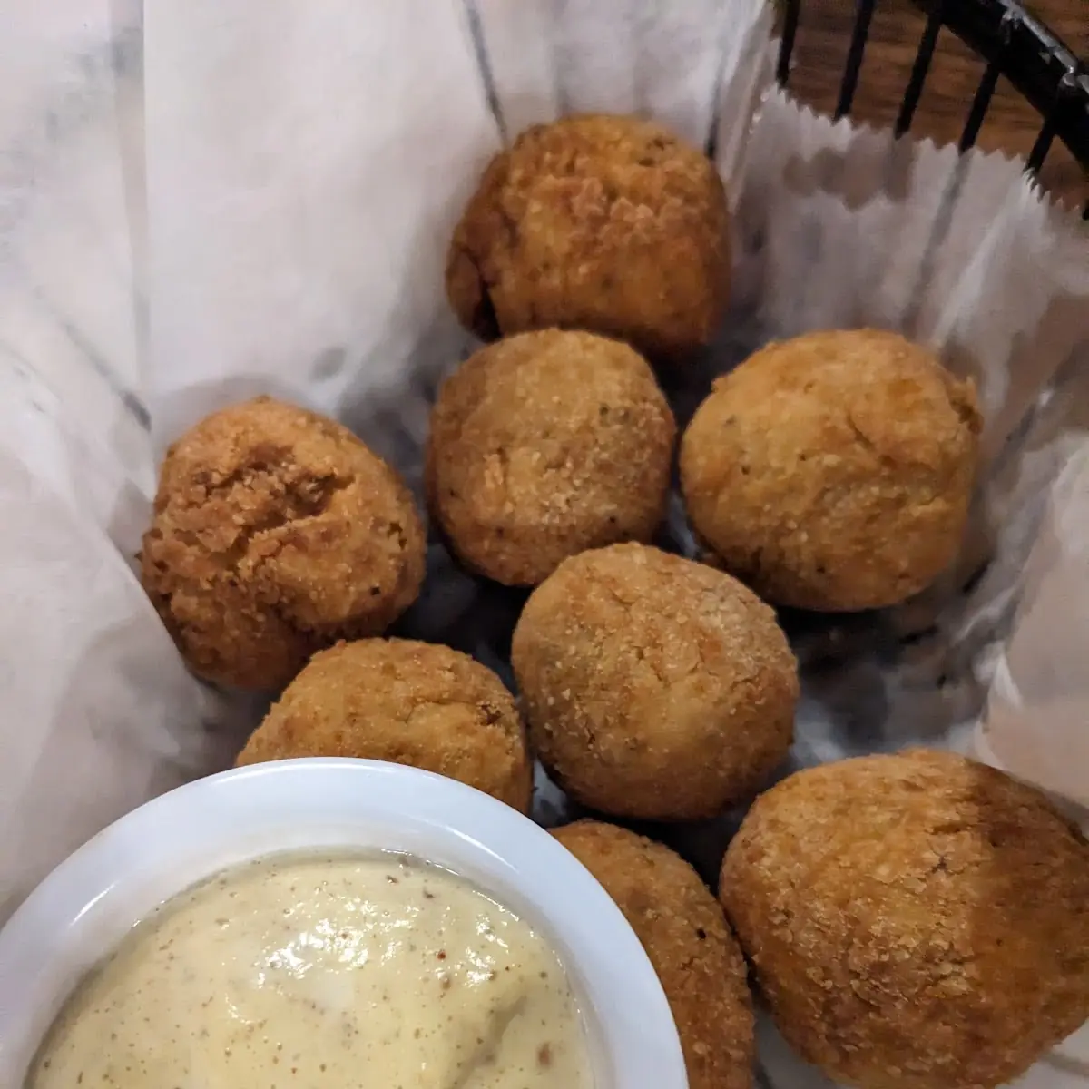 Sauerkraut Balls with Cheese Sauce